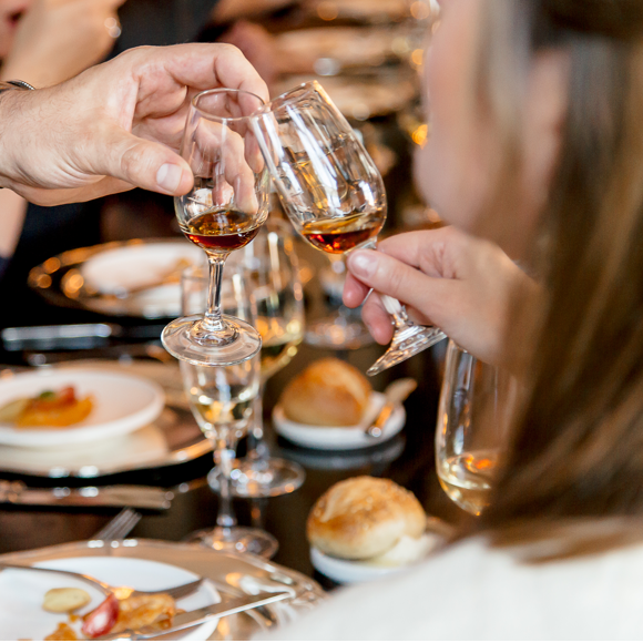 A group of people making a toast